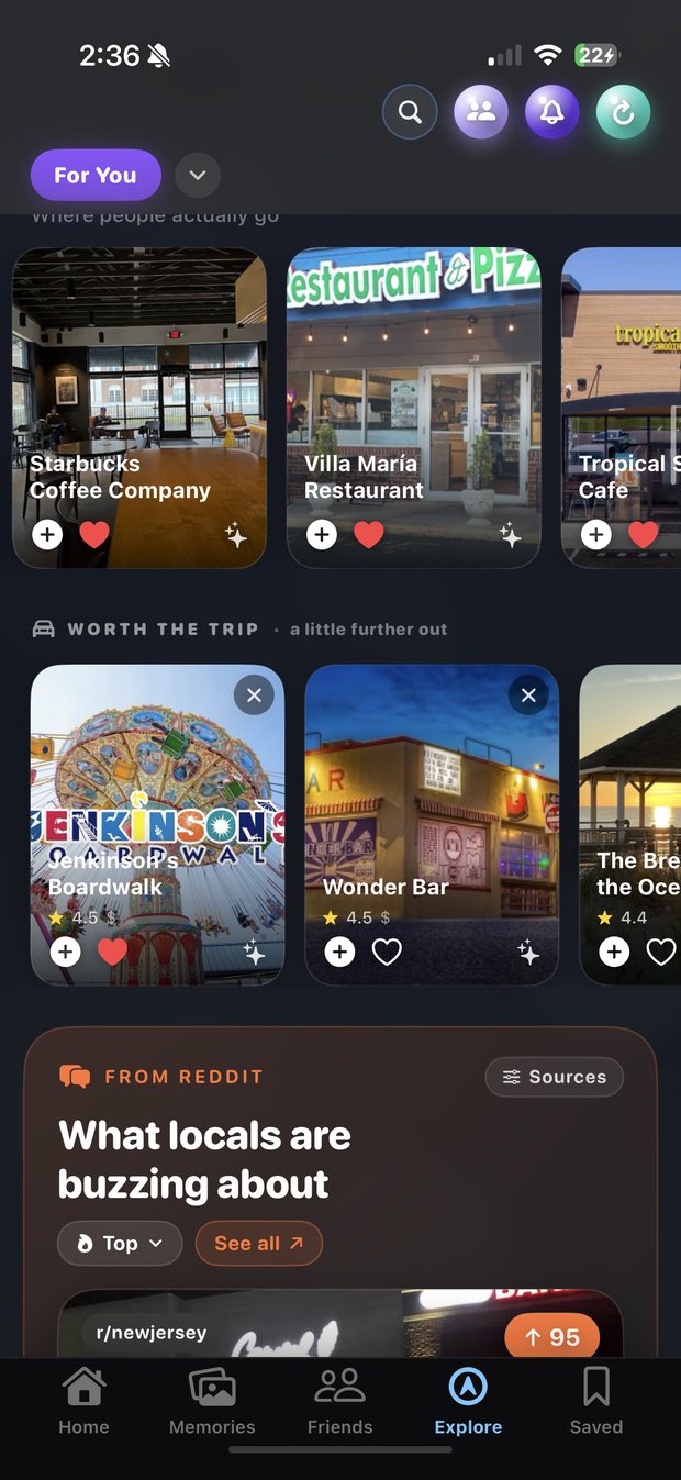 The NextStop Explore feed showing ranked places near you