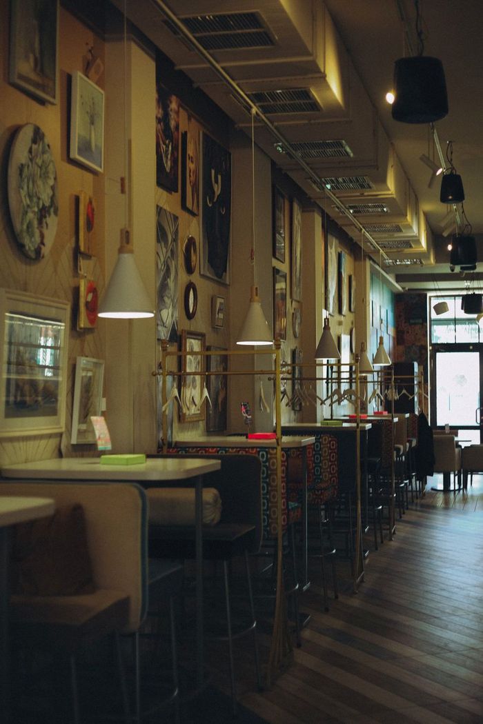 Inside a dim cafe at night